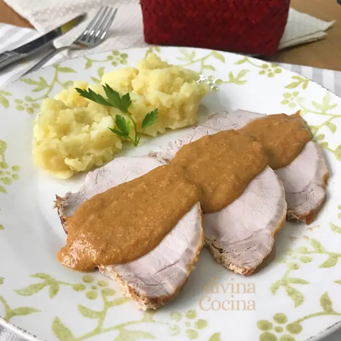 Cinta de lomo de cerdo guisado en leche