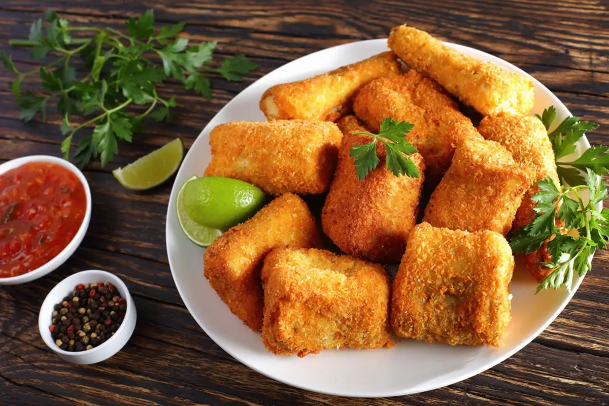 Merluza con costra de pan: receta crujiente
