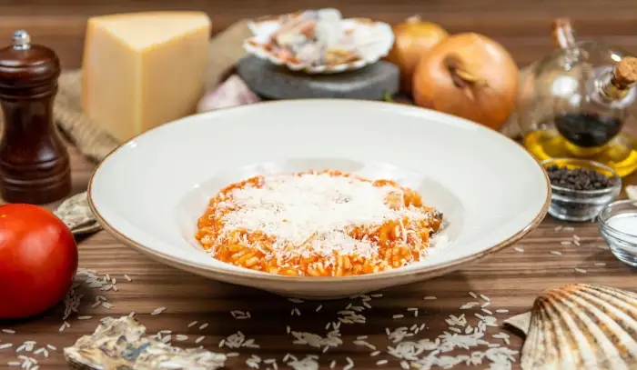 Receta de arroz cremoso con tomate y queso
