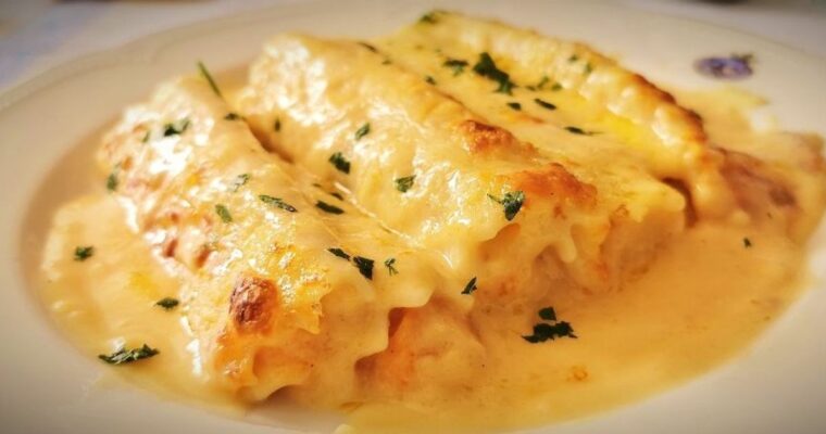 Savor the Flavors of the Sea with Canelones de Merluza y Langostinos con MAMBO