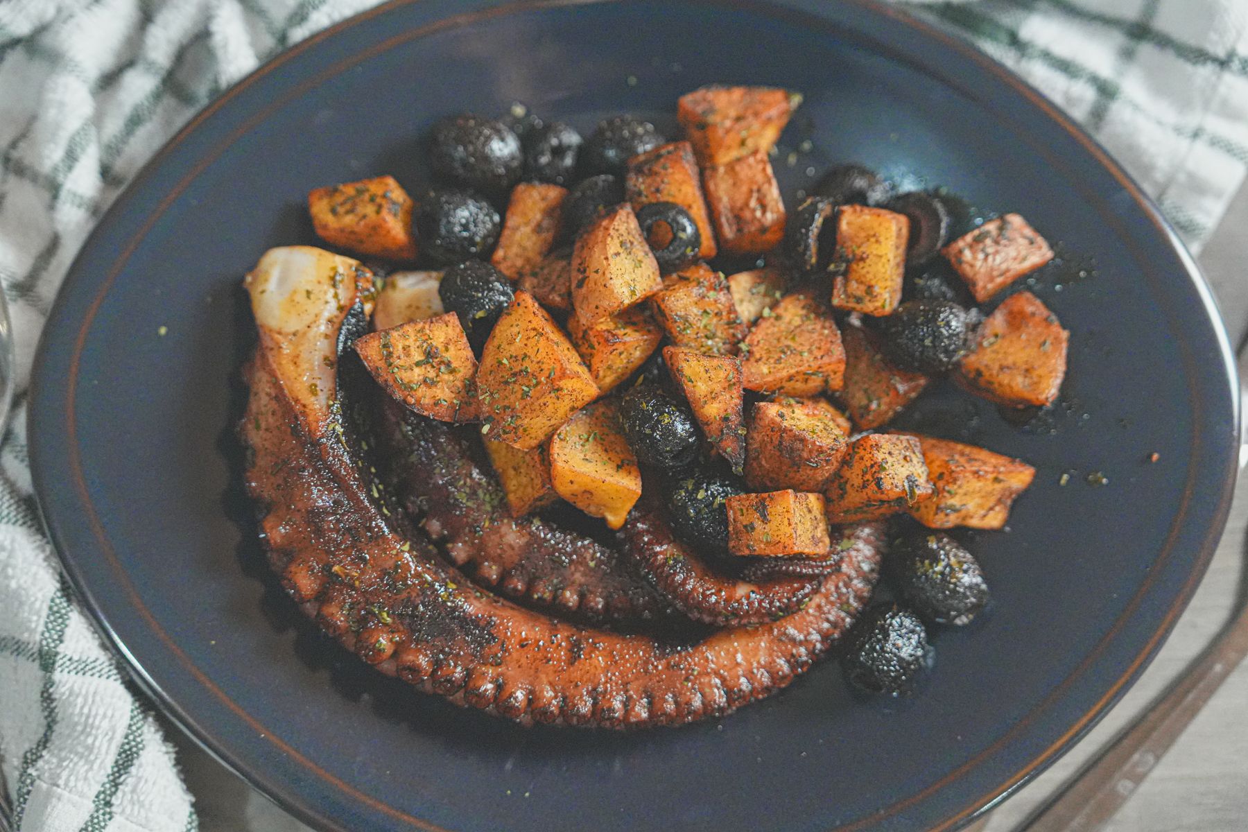 Experience Spanish cuisine at home with Pulpo con Patatas using monsieur cuisine