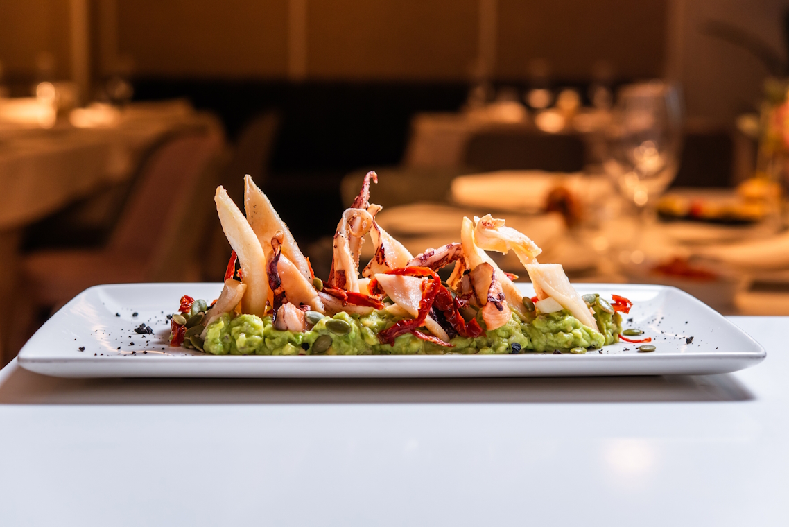 Experience the Flavors of Arroz Seco con Pollo y Langostinos with MAMBO