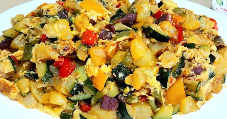 Whip up a delicious Revuelto de calabacín y gambas with your Olla GM