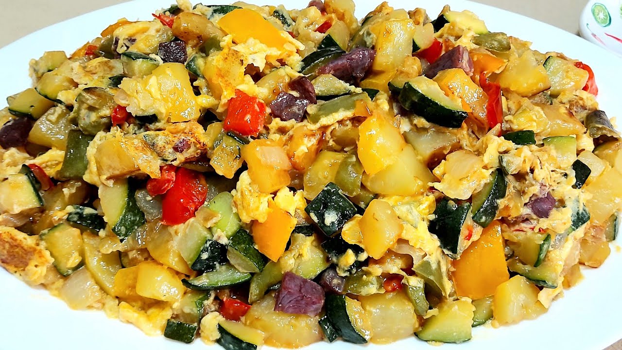 Whip up a delicious Revuelto de calabacín y gambas with your Olla GM