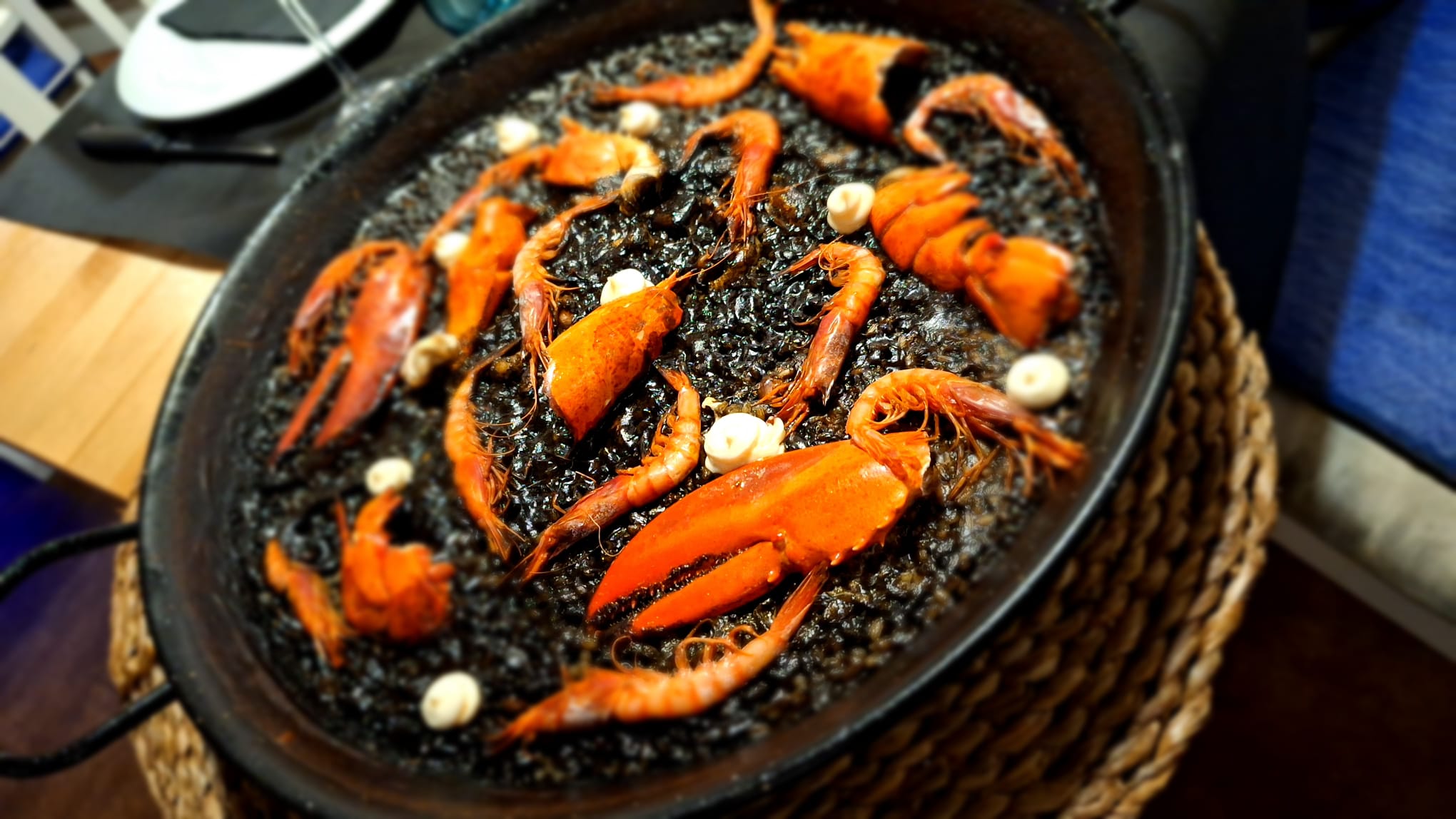 Experience the Ultimate Fusion of Flavors with Paella con Mambo
