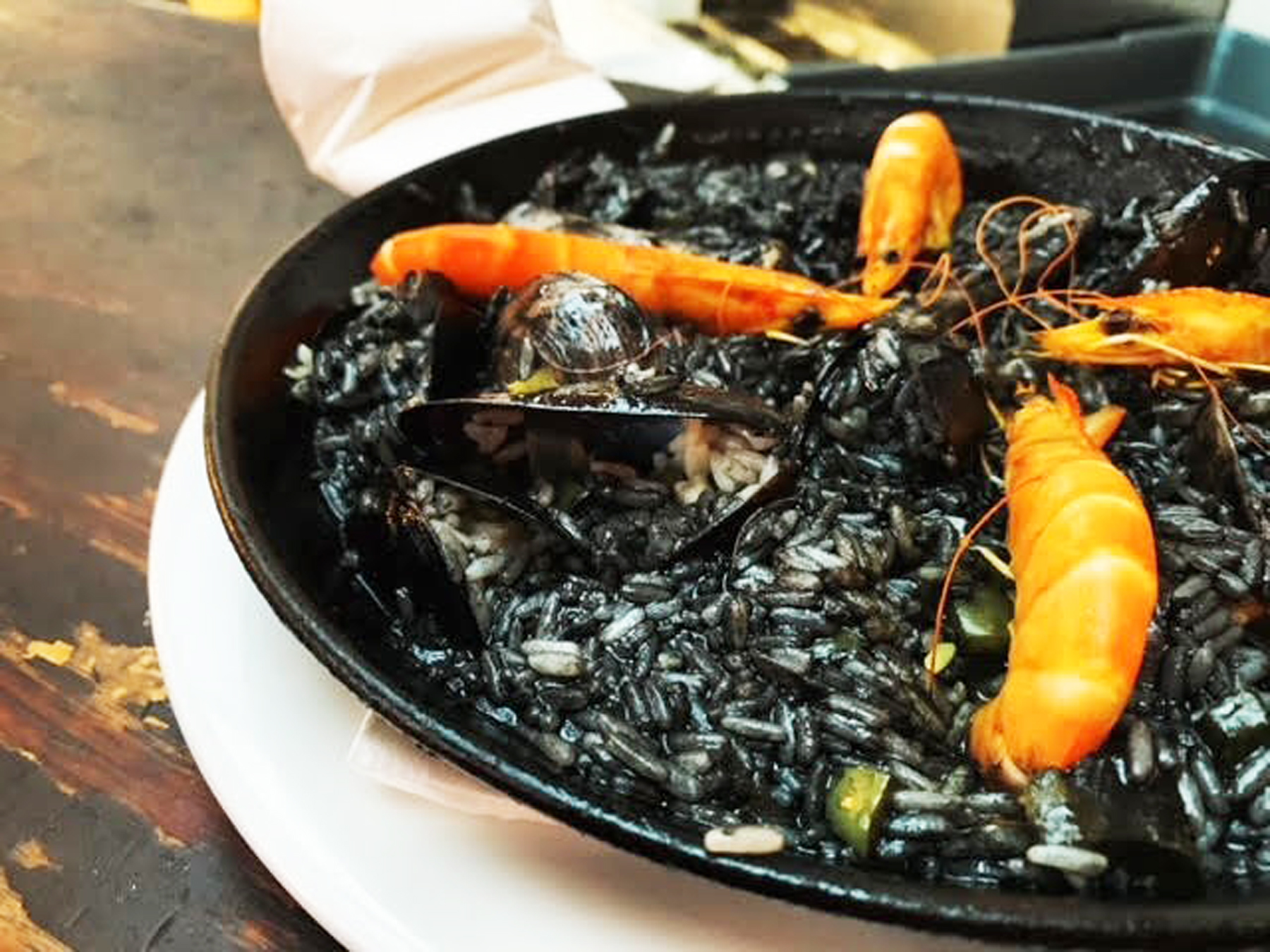 Indulge in the Bold Flavors of Arroz Negro con Mambo